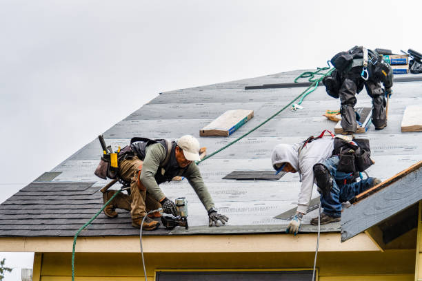 Professional Gutter Installation technician working in Ronan, MT